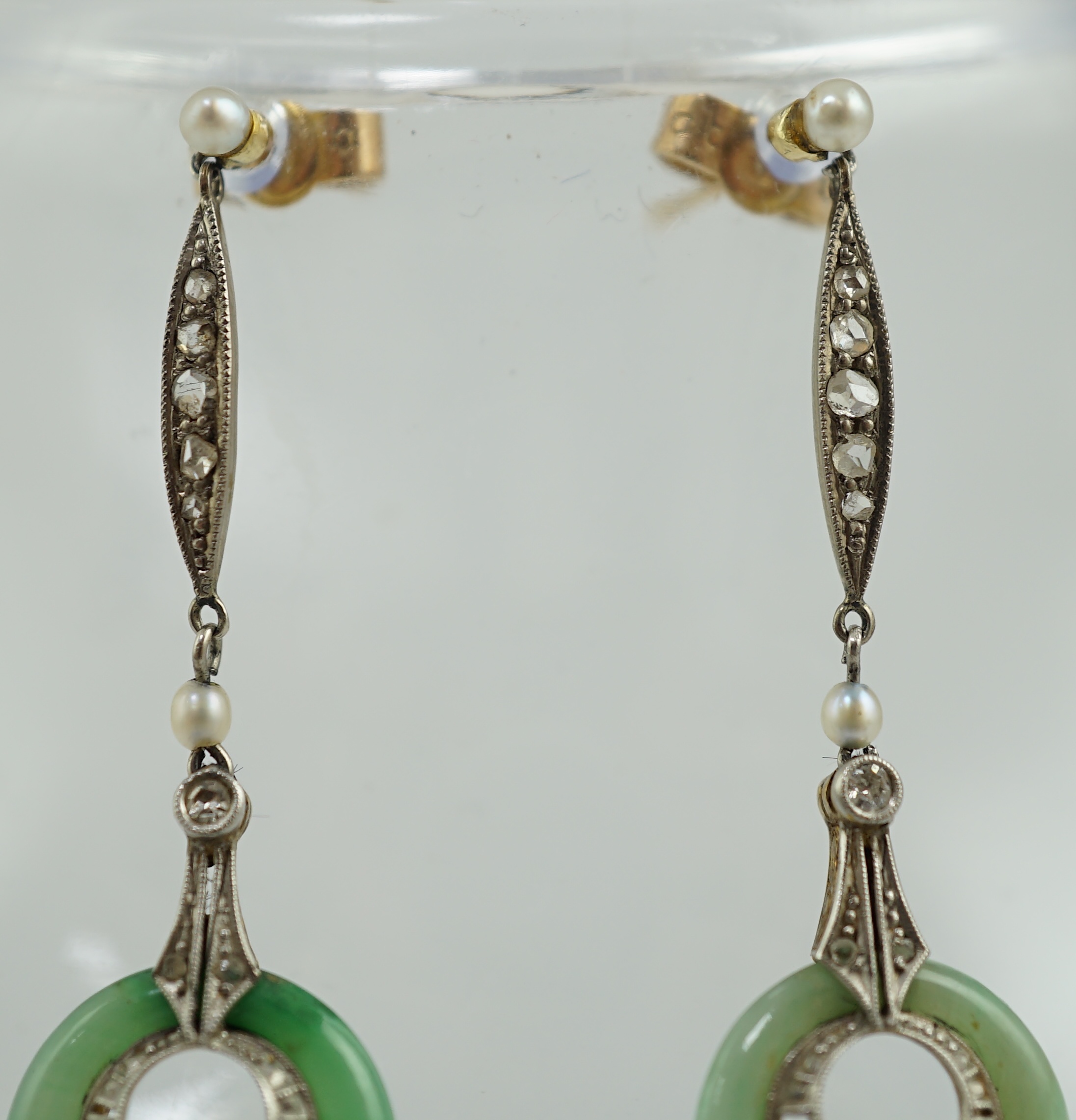 A pair of 1920's 18ct gold, diamond, seed pearl and jade disc set drop earrings